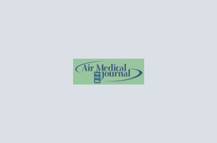 Logo for "Air Medical Journal" with a green and blue color scheme, featuring a stylized medical symbol and swoosh graphic on a light gray background.