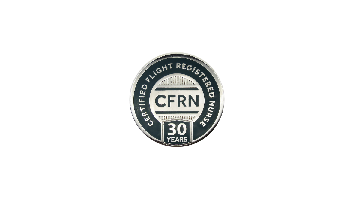 Round pin with "Certified Flight Registered Nurse," "CFRN," and "30 Years" written on it, featuring a silver and dark blue design.
