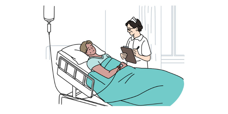 A patient lies in a hospital bed with an IV as a nurse stands nearby, holding a clipboard and taking notes.