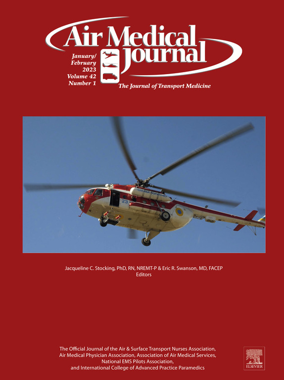 A red and white rescue helicopter in flight appears on the cover of the Air Medical Journal, January/February 2023 issue.