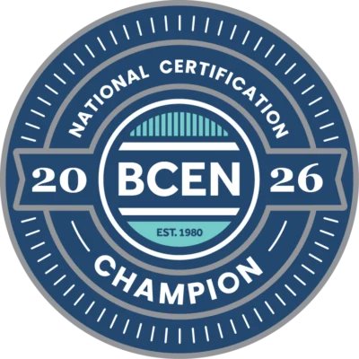 Circular badge with “BCEN” in the center, surrounded by “2026 BCEN NCC Award,” “National Certification Champion 2026,” and “Est. 1980.” Blue, teal, and white color scheme.